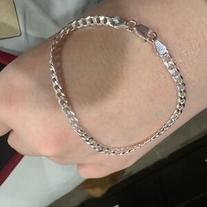 Cuban link Sterling Silver bracelet made in Italy. Brand new! Comes gift boxed.